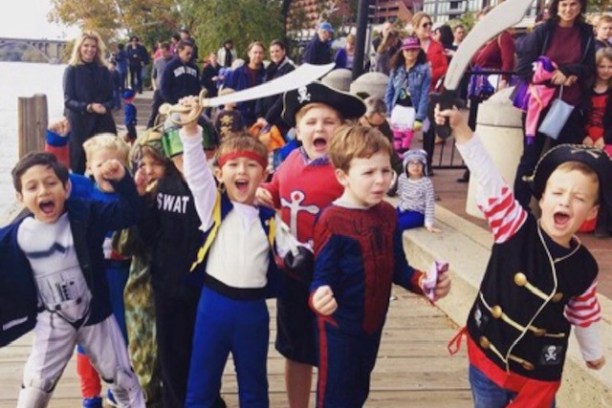 a group of people standing in front of a crowd