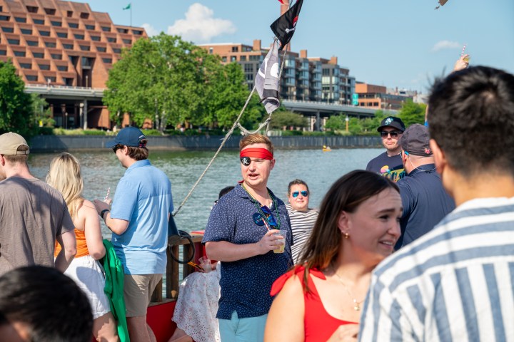 a group of people standing in front of a crowd