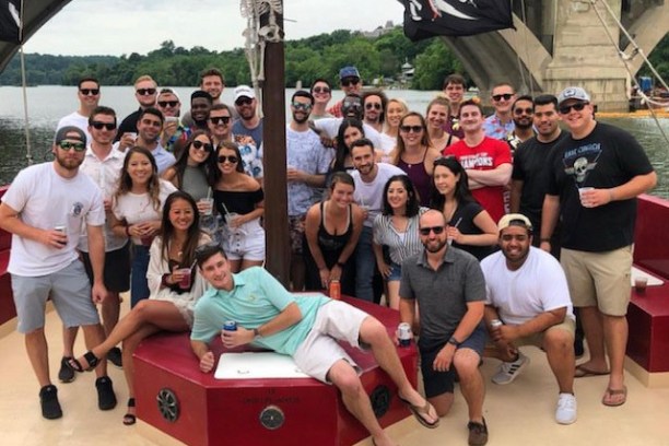 a group of people standing in front of a crowd