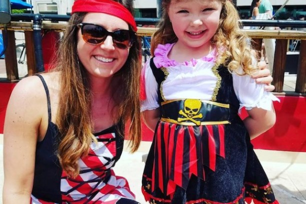 a little girl posing for a picture