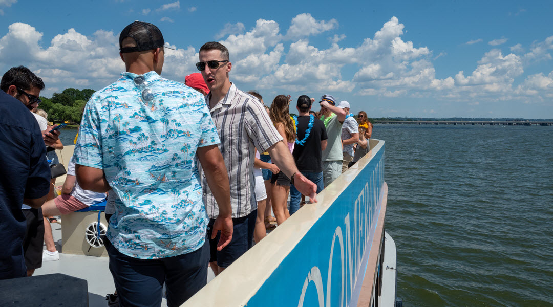 People Enjoying At Open-Air Rooftop Cruise