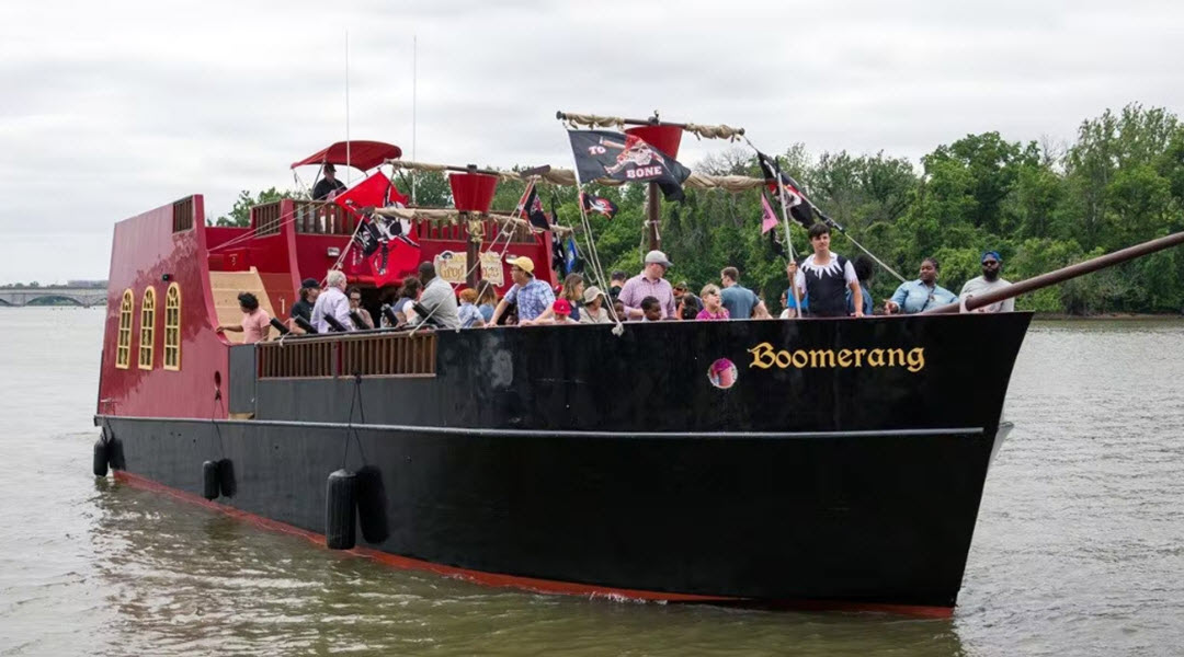 People Enjoying Open Air Pirate Ship Cruise People Enjoying Open Air Pirate Ship Cruise