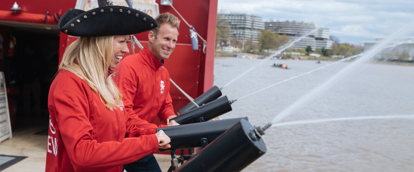 the owners of Boomerang Boat Tours on a pirate ship