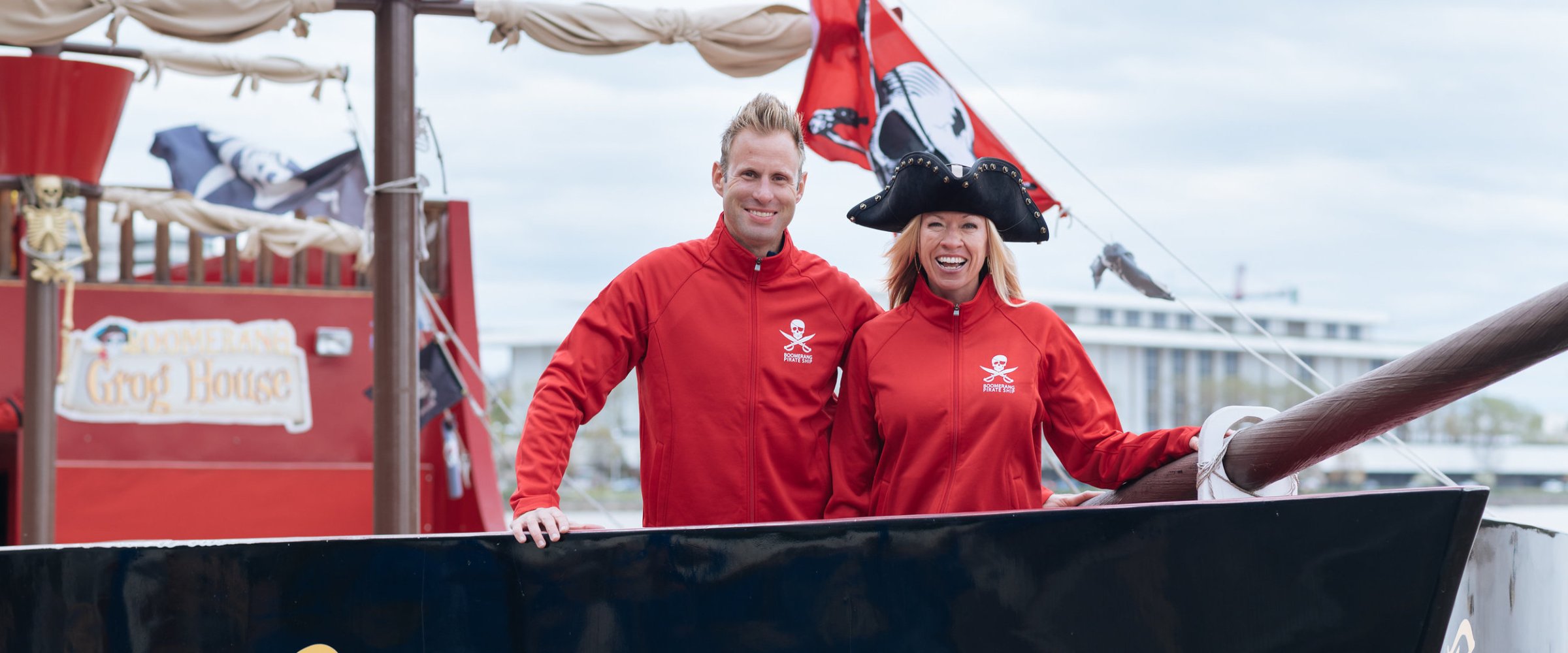 the owners of Boomerang Boat Tours on a pirate ship