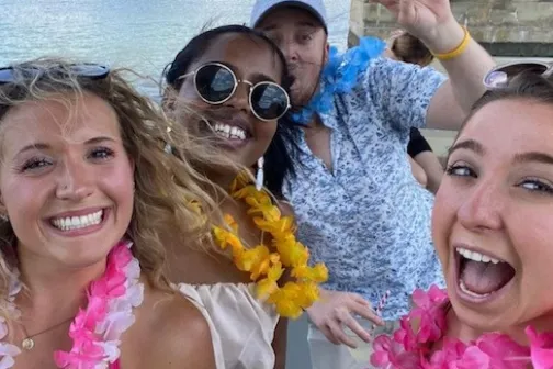 a group of people posing for the camera