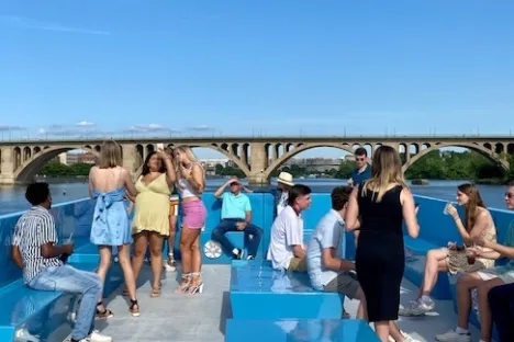 a group of people standing in a pool